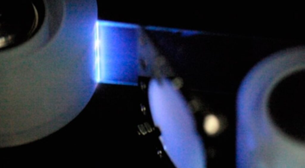 A line of blue light at the point where adhesive tape separates from the roll. Image source: fiatphysica.com
