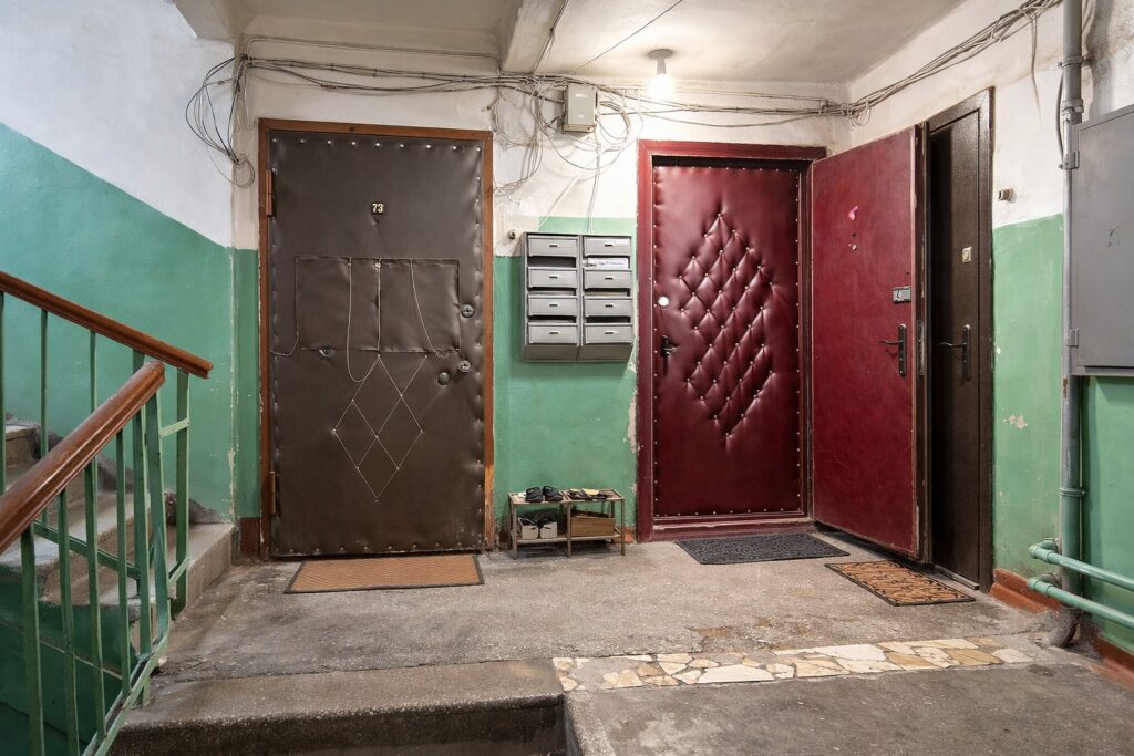 Why Front Doors in the USSR Were Upholstered with Leatherette. Leatherette is a durable artificial leather on a fabric base, which was widely used in the USSR for door upholstery due to its cheapness and practicality. Why Front Doors in the USSR Were Upholstered with Leatherette. Leatherette is a durable artificial leather on a fabric base, which was widely used in the USSR for door upholstery due to its cheapness and practicality. Photo.