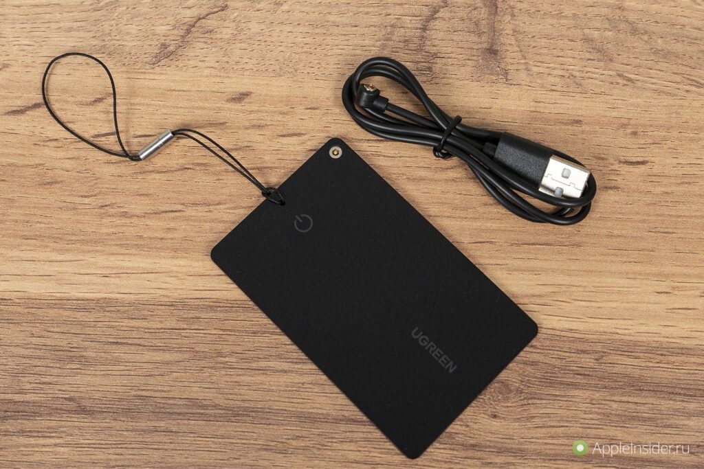 Charging cable and strap are included. But don't lose the cable — finding a replacement won't be easy.