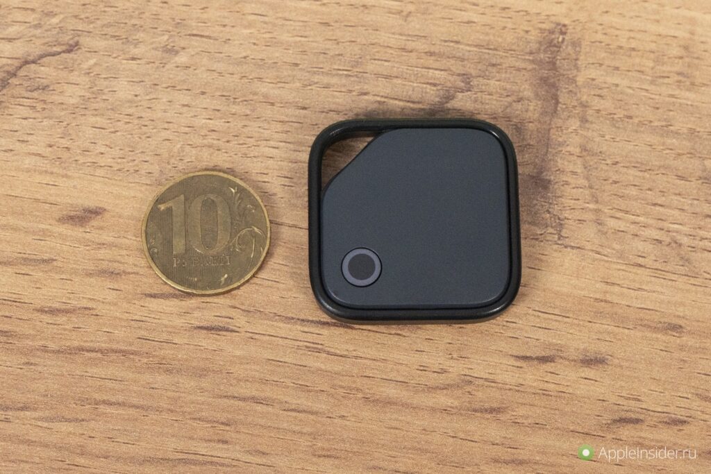 The tag is slightly larger than a coin.