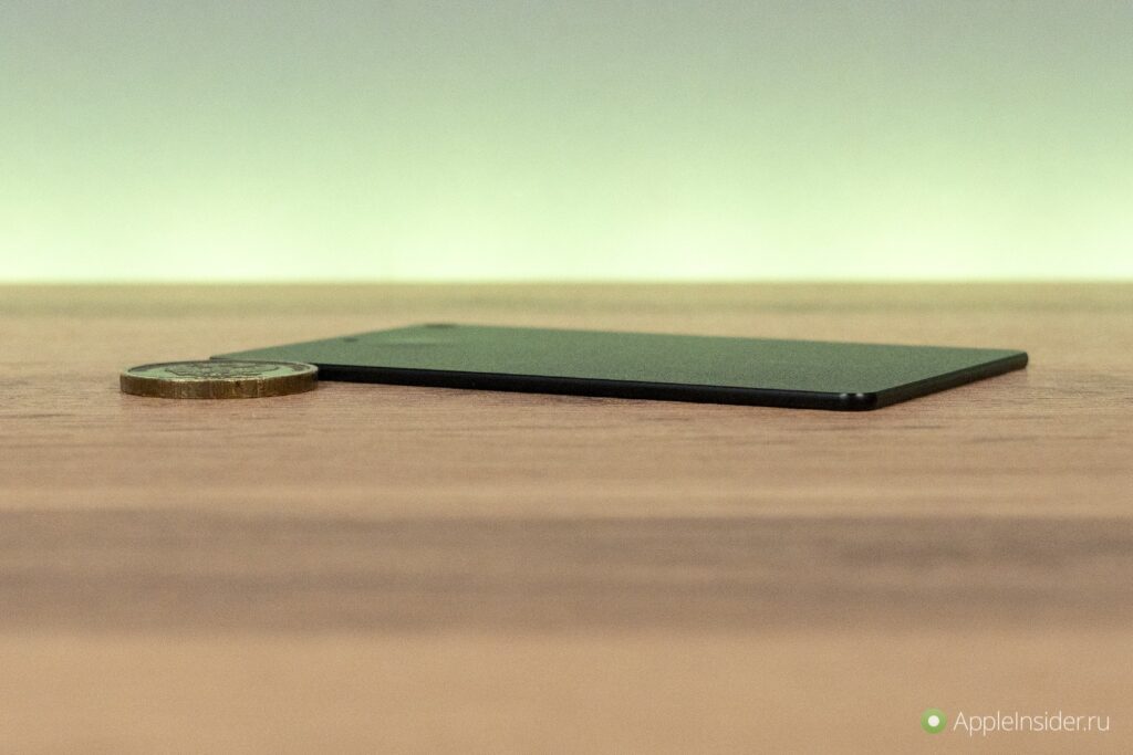 The card is thinner than a coin and only twice as thick as a bank card.