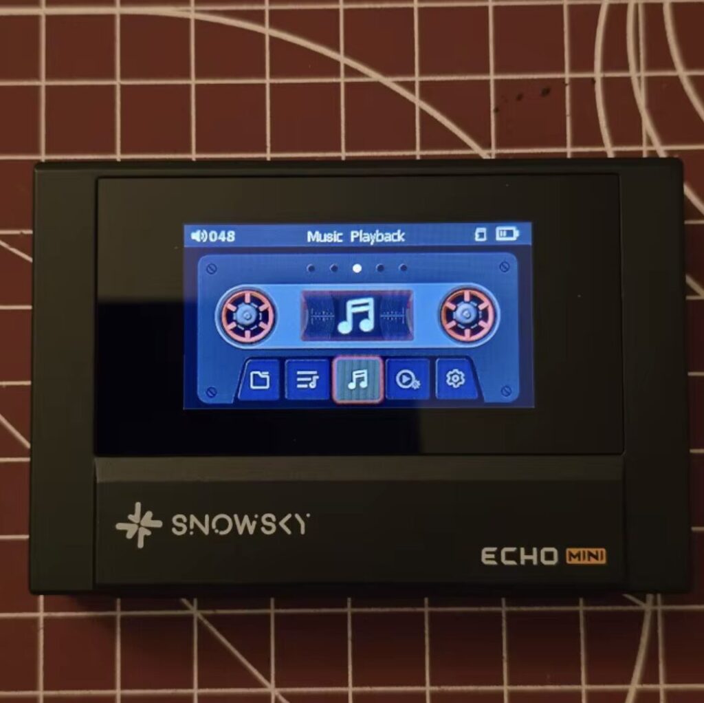 MP3 player for music without a phone. Looks like a retro cassette. Photo.