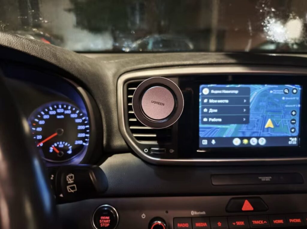 Magnetic car phone holder. A simple holder for iPhone owners. Photo.