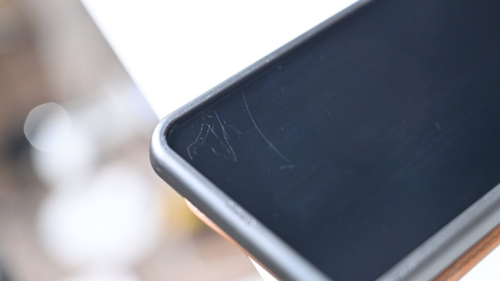 Screen Protective Film: Pros and Cons. The film is thinner and cheaper, but after a couple of months it looks like this. Photo.