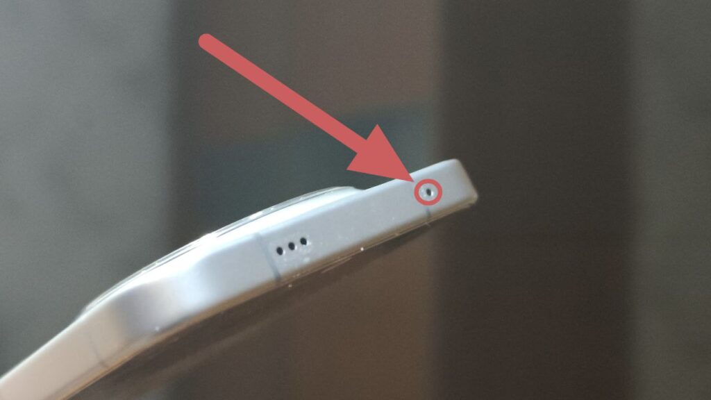 Noise-Canceling Microphone on a Smartphone. The noise-canceling microphone is located at the top. Noise-Canceling Microphone on a Smartphone. The noise-canceling microphone is located at the top. Photo.