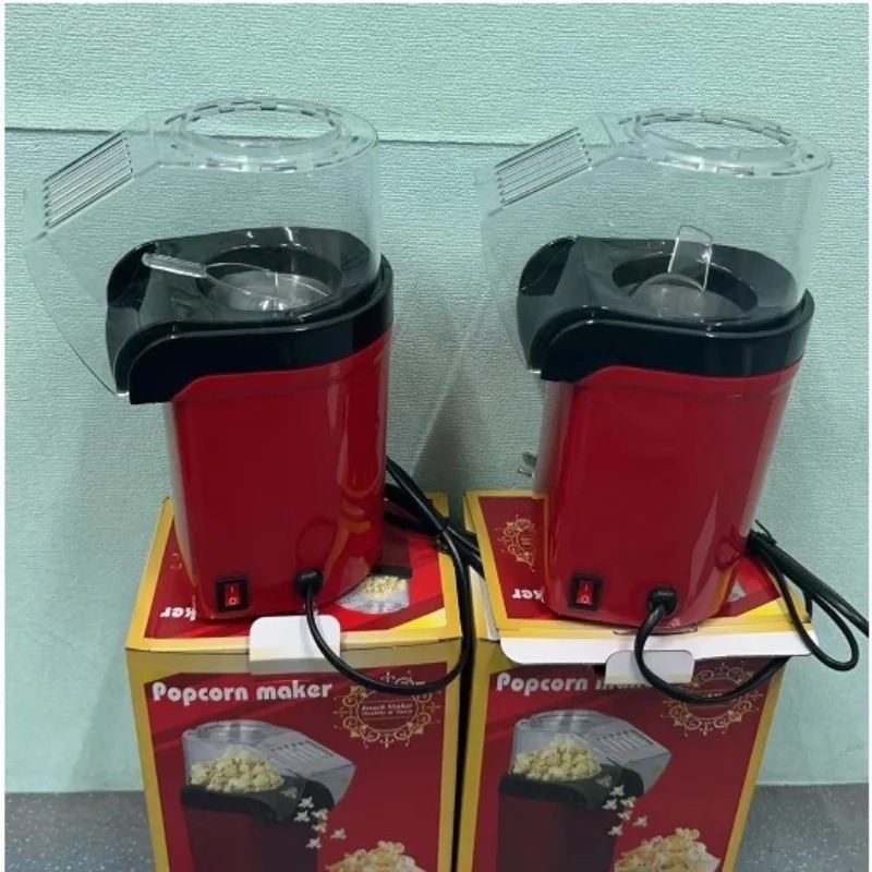 Electric Popcorn Machine. A machine designed specifically for making popcorn. Electric Popcorn Machine. A machine designed specifically for making popcorn. Photo.