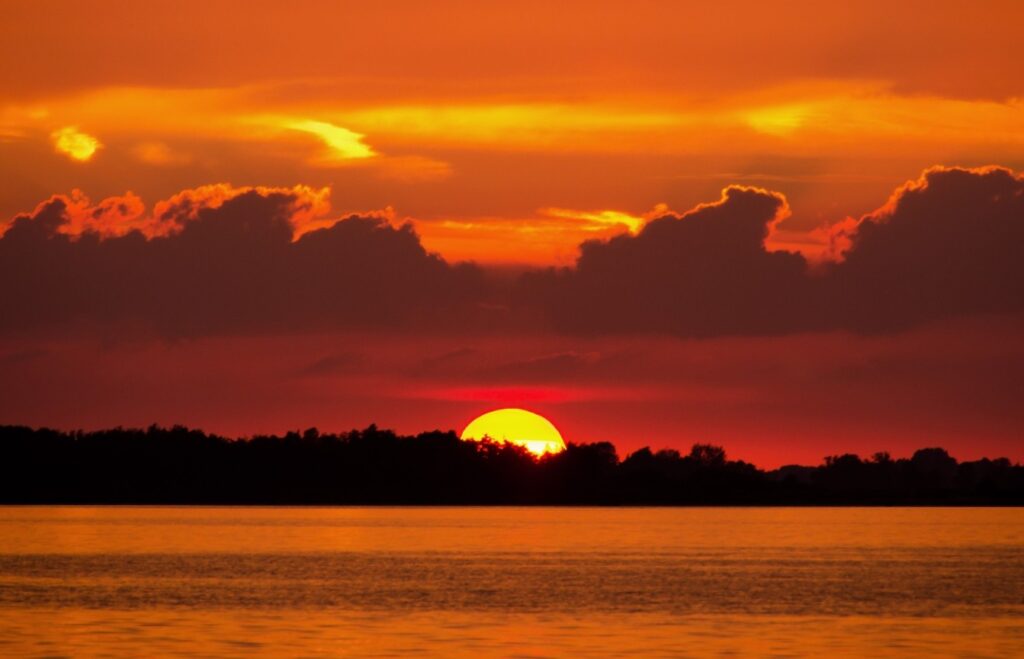 Why Sunsets and Sunrises Are Red. A sunset is the result of the blue portion disappearing from white light. Photo.