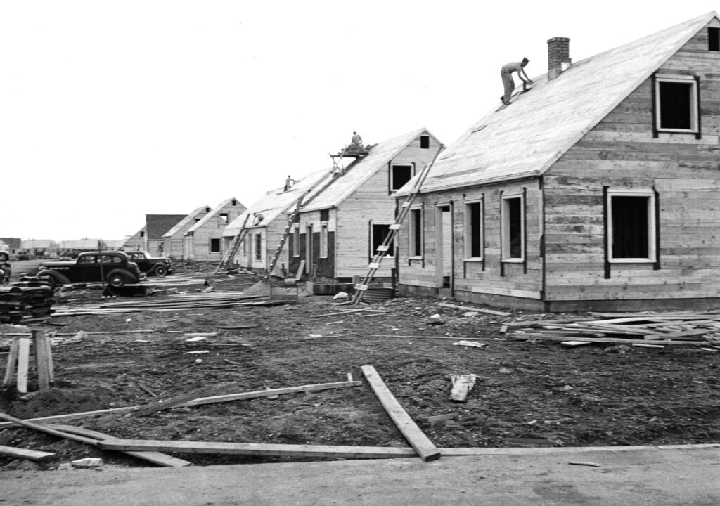 Construction of Levittowns in the USA. Image source: businessinsider.com
