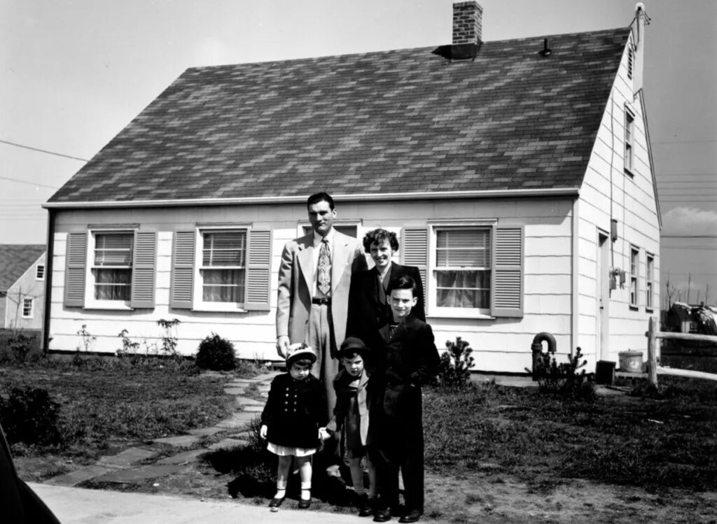A family near their new Levittown home. Image source: businessinsider.com