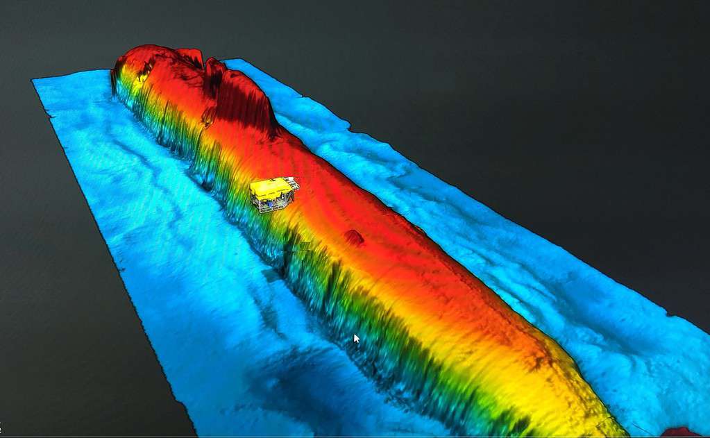 High-resolution sonar scan of Komsomolets on the seabed in the Norwegian Sea. The image also shows the Ægir 6000 vehicle during operations around the submarine. Image source: zmescience.com. Photo.