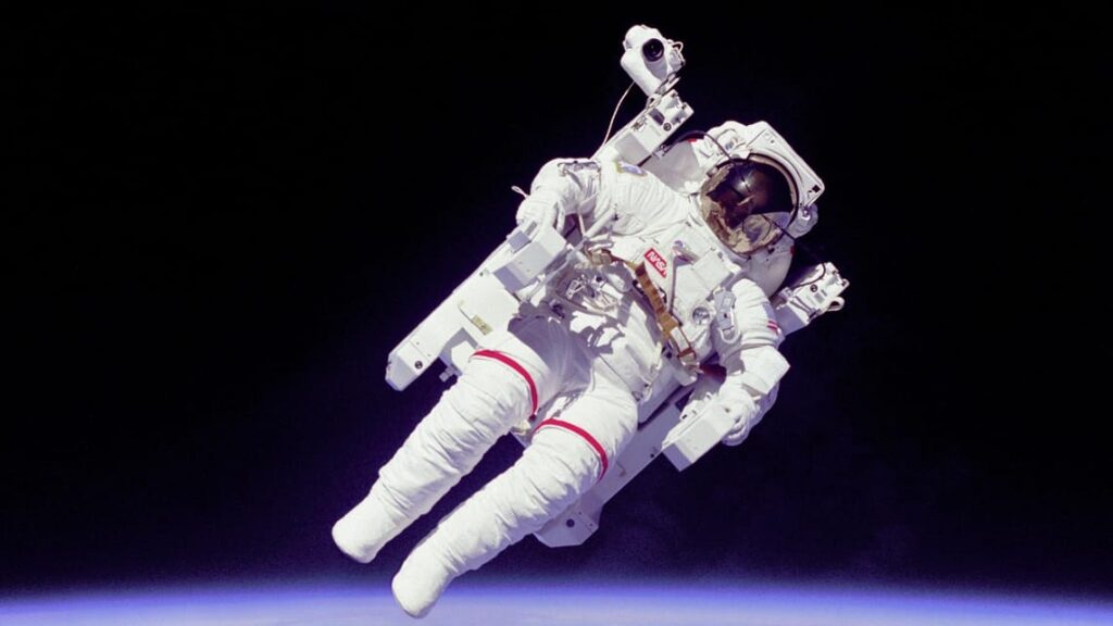 NASA astronaut Bruce McCandless II uses the Manned Maneuvering Unit outside the Space Shuttle Challenger during mission STS-41-B in 1984. Image source: starwalk.space. Photo.