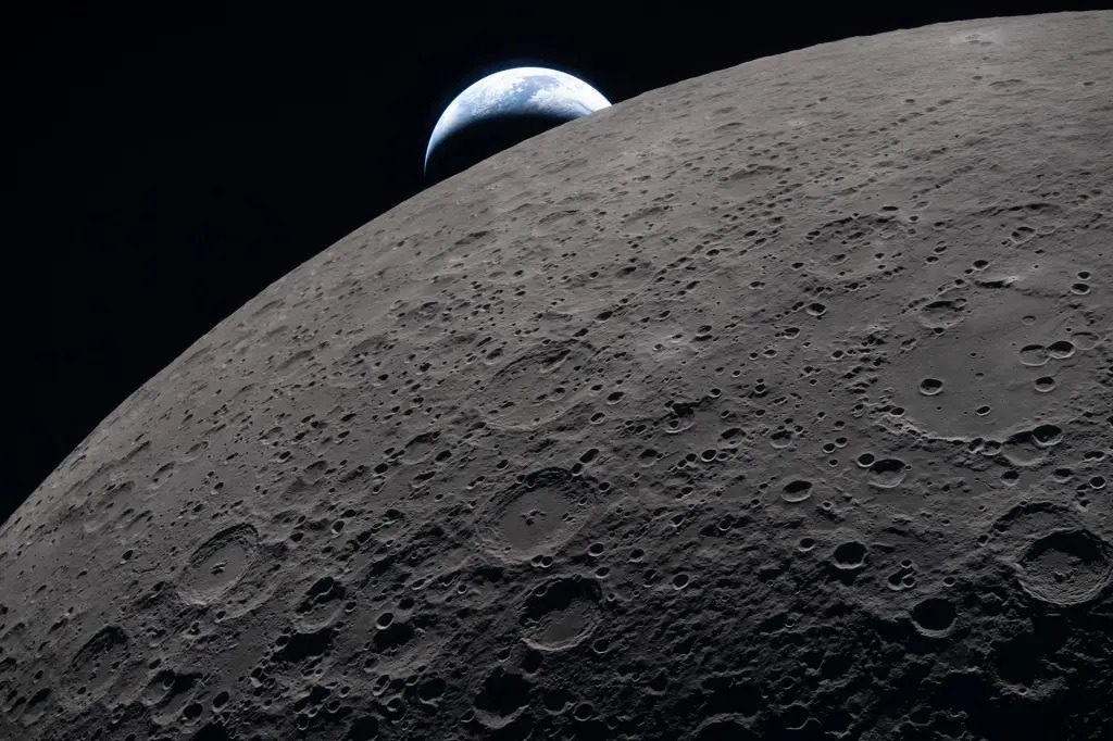 The Moon, Earth, and Ohm crater photographed during Artemis II