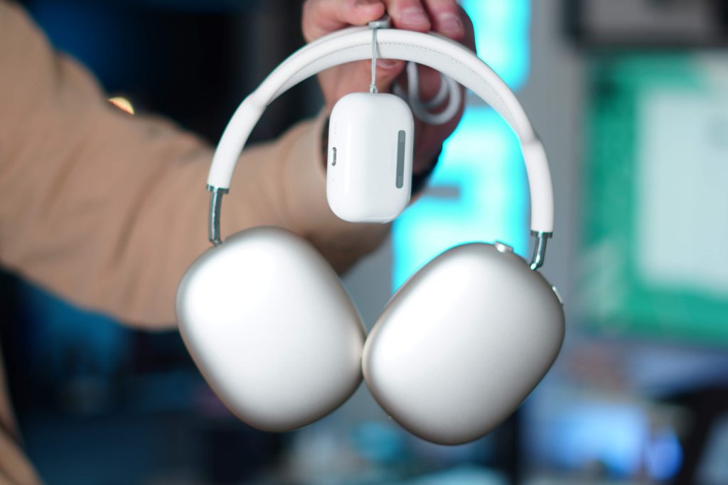 Choosing Apple headphones. Photo.