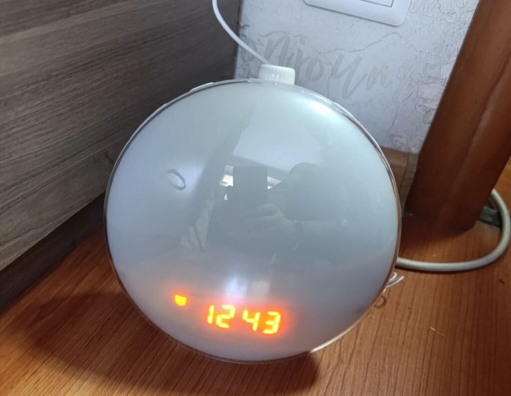 The alarm clock simulates sunlight, so it's useful even on cloudy days
