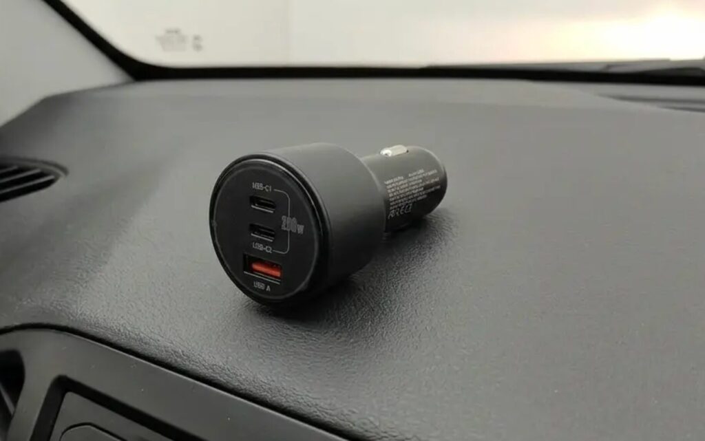 Two USB-C and one USB-A — enough for the driver and all passengers.