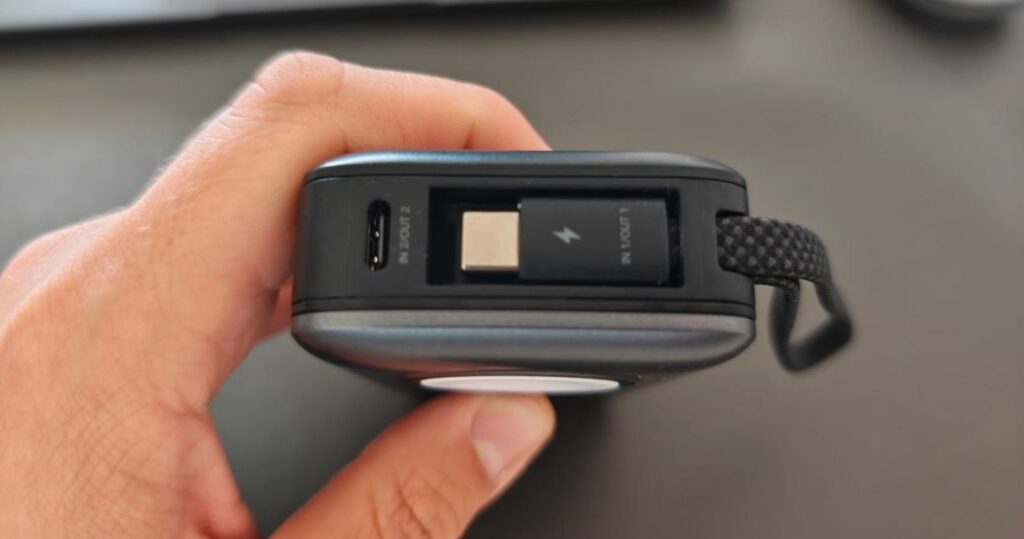 The cable neatly tucks into a dedicated compartment. But it's easy to pull out