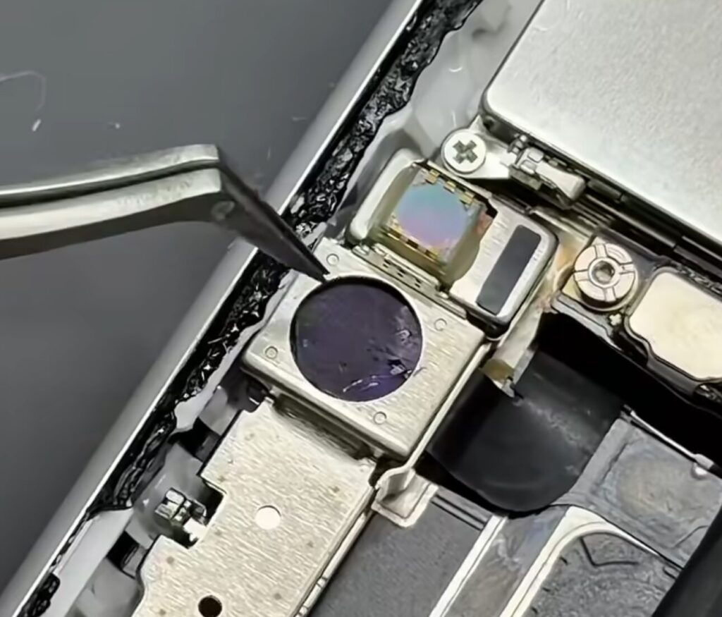 Does MAX spy through the iPhone's camera and microphone? The front camera is replaced with a dummy and all microphones are removed. Photo.