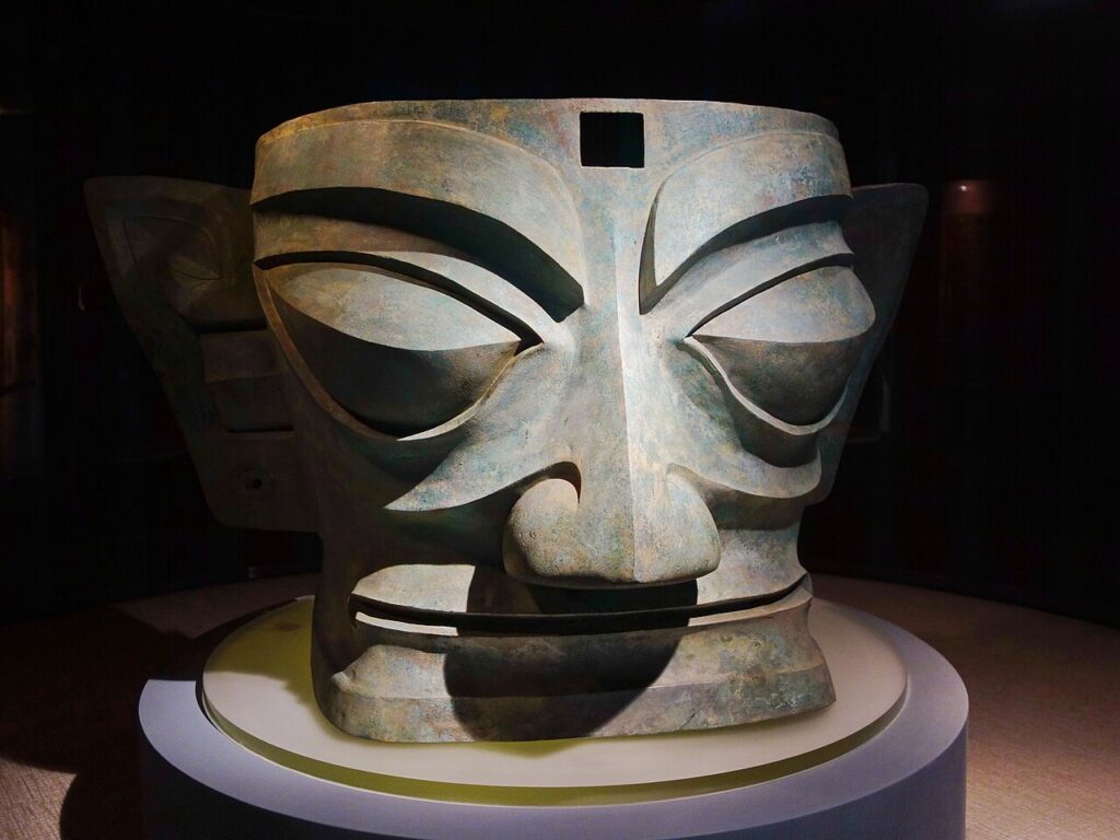 Sanxingdui bronze mask. Image source: en.wikipedia.org. Photo.