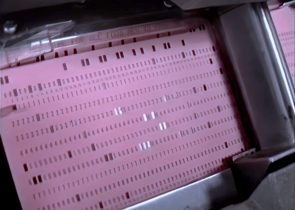 To 'communicate' with the Voyager's onboard computer systems, engineers had to use a punch card system. Image source: Popular Science. Photo.