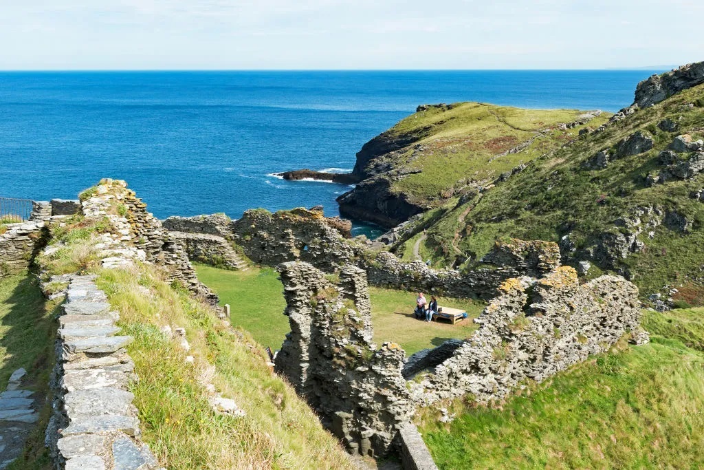 Ruins of Tintagel Castle in Cornwall — one of the places that legends associate with King Arthur. Photo.