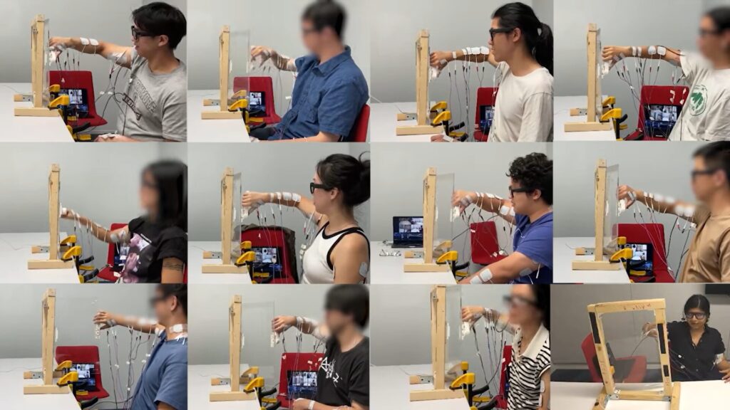 Participants test the system to open an unfamiliar window. The AI identifies the handle type and uses electrodes to guide the fingers, wrist, and elbow in the correct sequence. Photo.