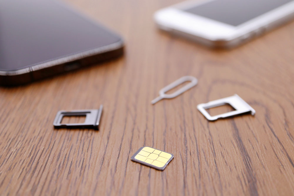Pros and cons of a regular SIM card. A physical SIM is easy to swap between any devices. Photo.