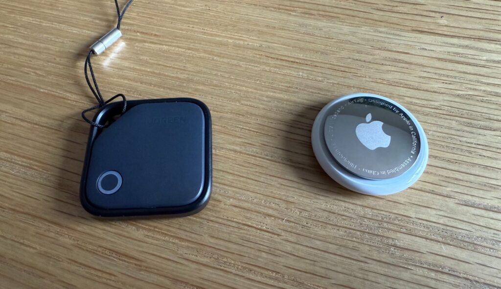 What Is the UGREEN Smart Tag and How It Differs from AirTag. Comparison with AirTag. Photo.