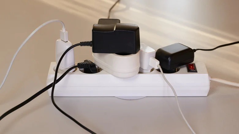 Cheap extension cords with thin wires can't handle the load from a generator and may melt. Photo.