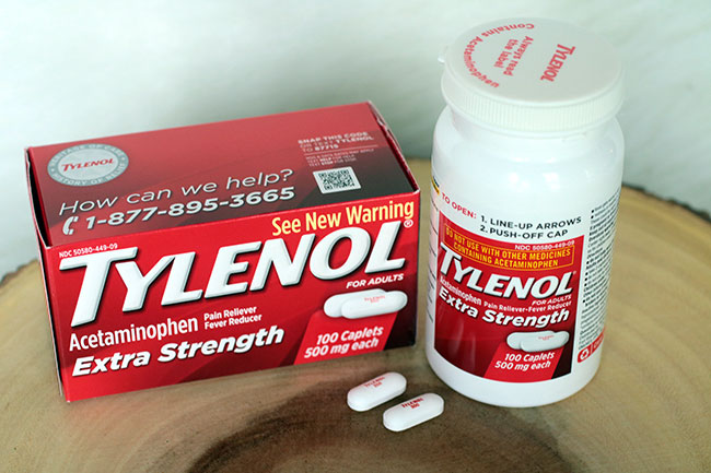 A pack of Tylenol Extra tablets with box. Photo.