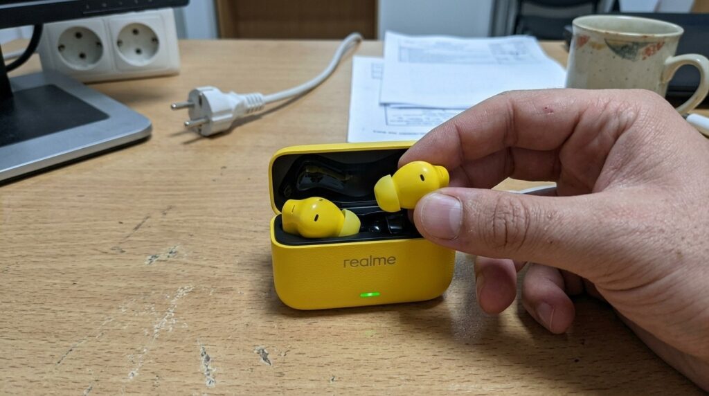 Yellow leather-textured case — finally, earbuds I don't have to search for all over the apartment