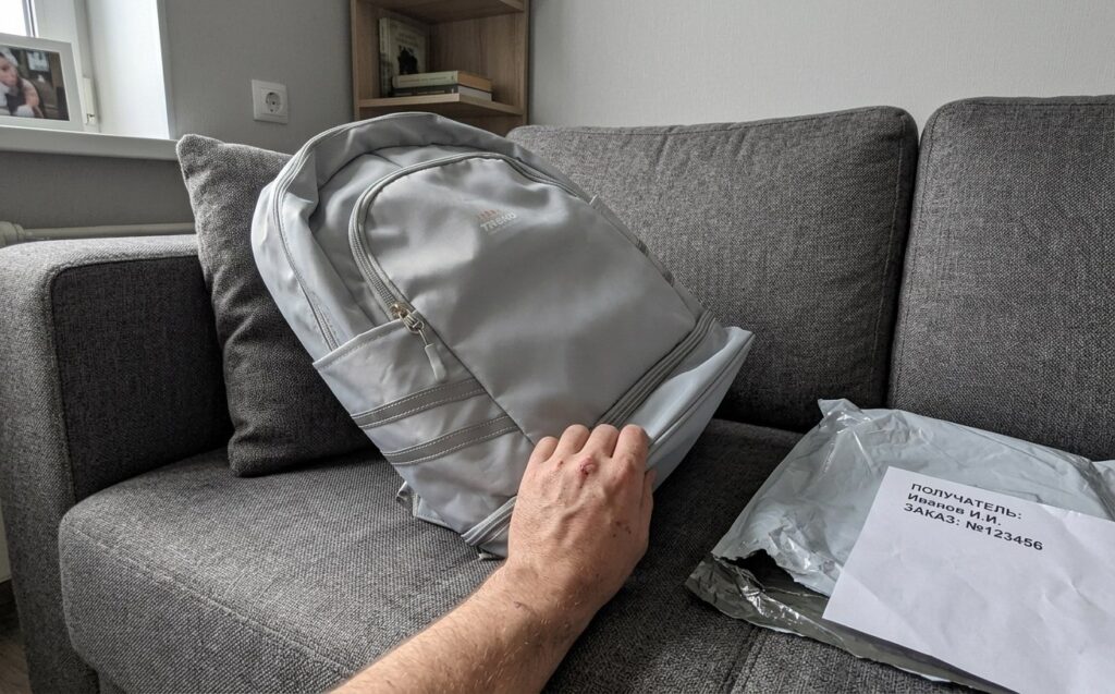 Waterproof backpack with a shoe compartment. The backpack actually has a detachable compartment at the bottom. Photo.