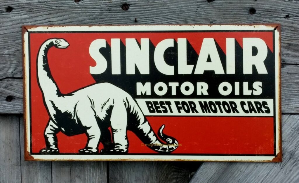Advertising poster of an oil company with a dinosaur mascot. Photo.
