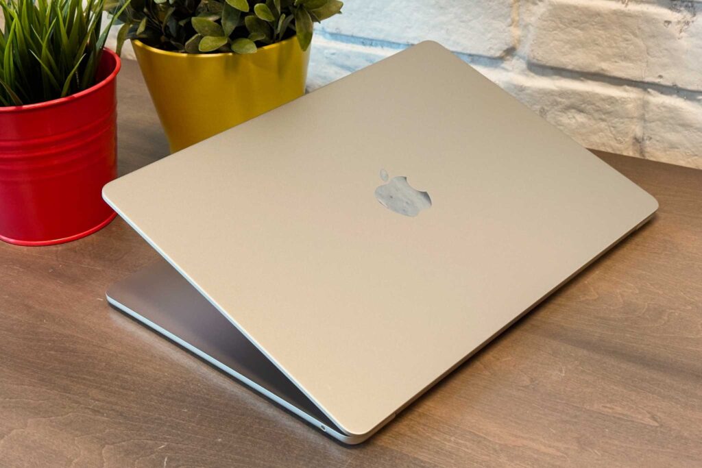 Some people carry their MacBook like this. The risks are obvious