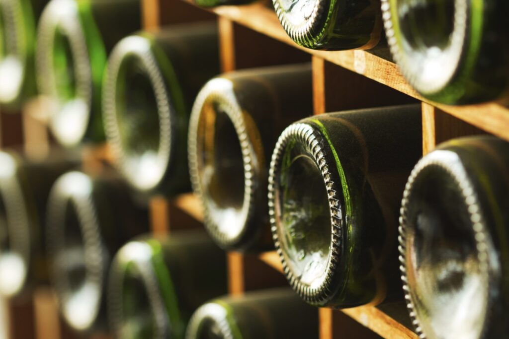 Why wine bottles have these strange indentations on the bottom. Photo.