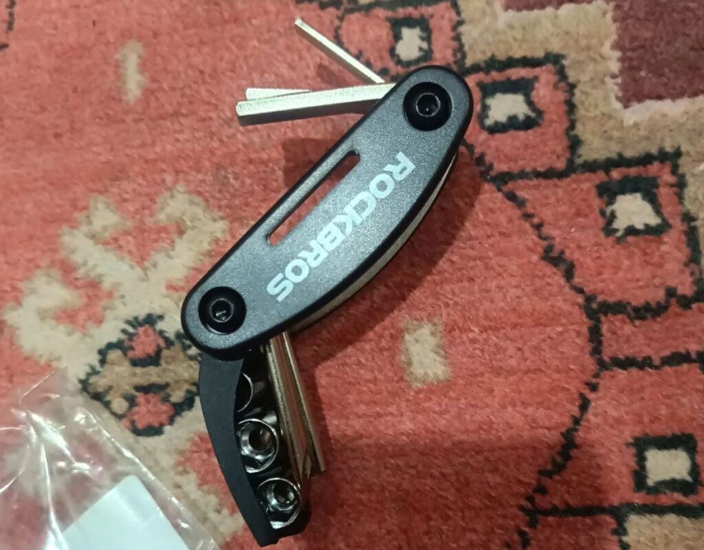 Bicycle repair tool kit. Just one device that contains a multitude of wrenches. Photo.