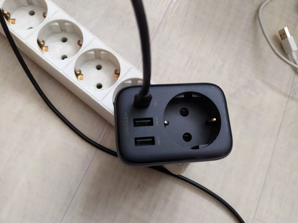 Well, well. An outlet, USB — all in one place now