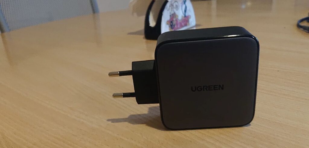 GaN charger at 100W with multiple ports. I especially recommend everyone buy this charger while it's available at a discount. Photo.