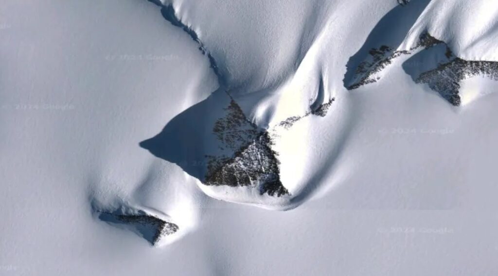 Satellite image of a mountain in Antarctica that resembles a pyramid. Image source: Live Science. Photo.