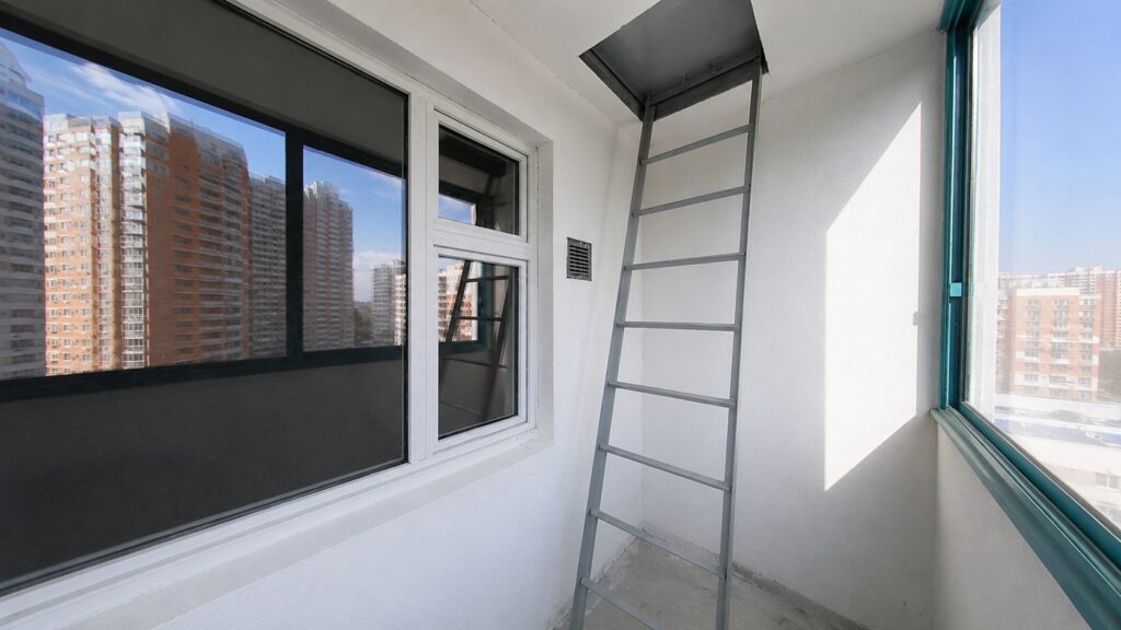 You cannot block the balcony hatch — you can be fined for it. Photo.