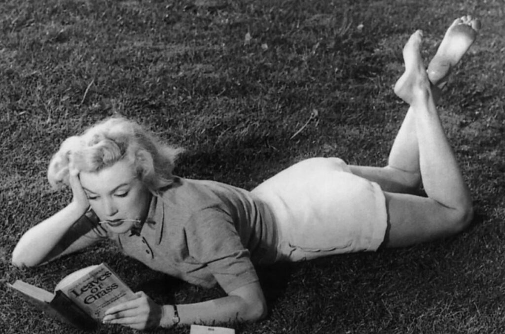 Dave Cicero, Marilyn Monroe reading 'Leaves of Grass,' 1951. Photo.