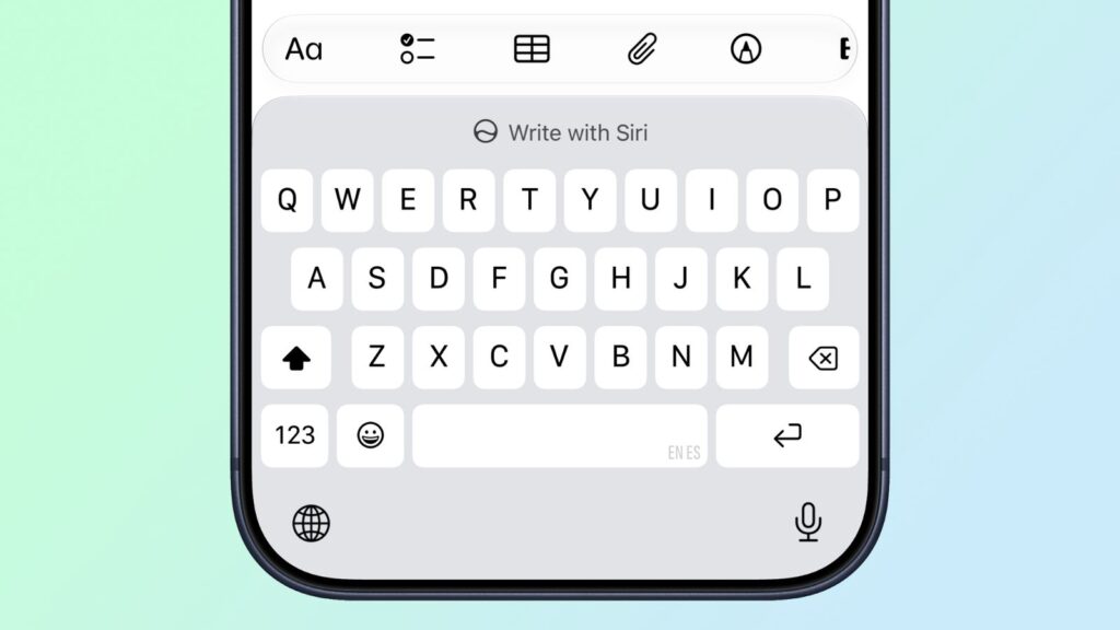 Where Is the Write with Siri Button Located. The button for working with text is located above the keyboard. Photo.