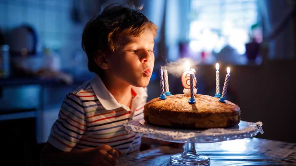 The tradition of blowing out candles on a cake traces back to Germany and Ancient Rome. Photo.