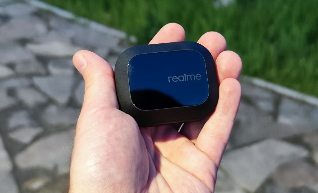 The earbuds case has a mirror-like surface