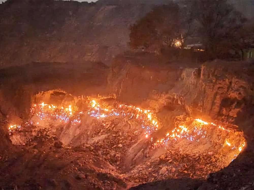A coal deposit burns beneath a village in Jharia, India.