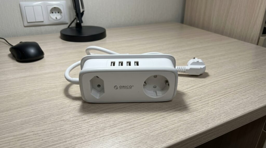 I toss it in my bag with the chargers — it's saved me on trains and at the countryside house. Photo.