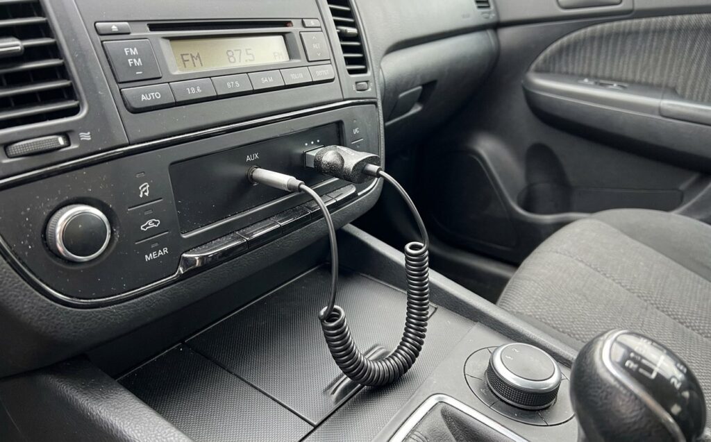 What to buy with an AliExpress promo code. A simple way to add Bluetooth to your car. Photo.