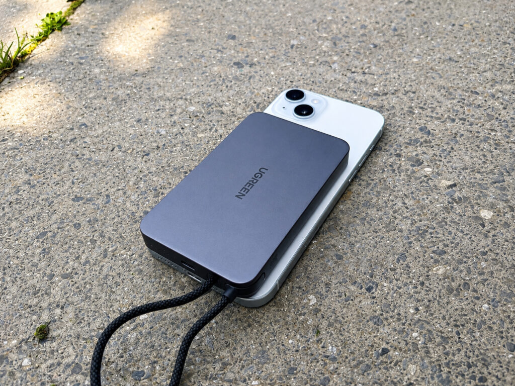 The battery slightly extends beyond the edges of the iPhone 15 Plus and 16 Plus body