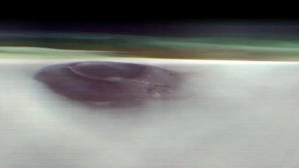 Arsia Mons is the second-tallest volcano on Mars after Olympus Mons and is twice as high as Everest. This image was taken by NASA's Odyssey orbiter.
