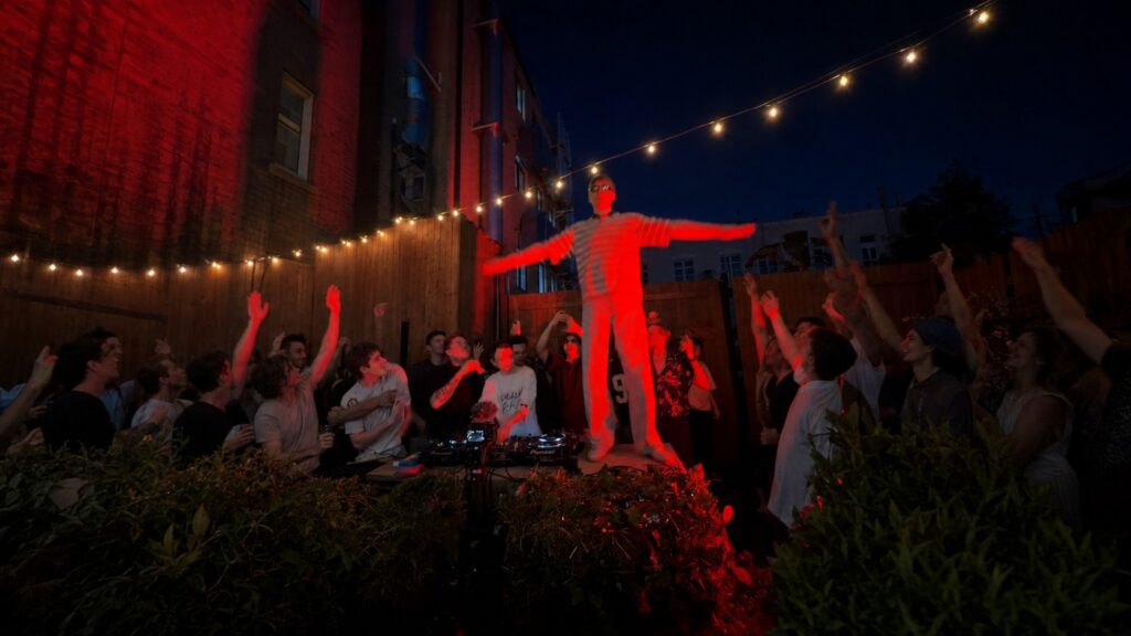 Cheba Man dancing Tecktonik at a courtyard party